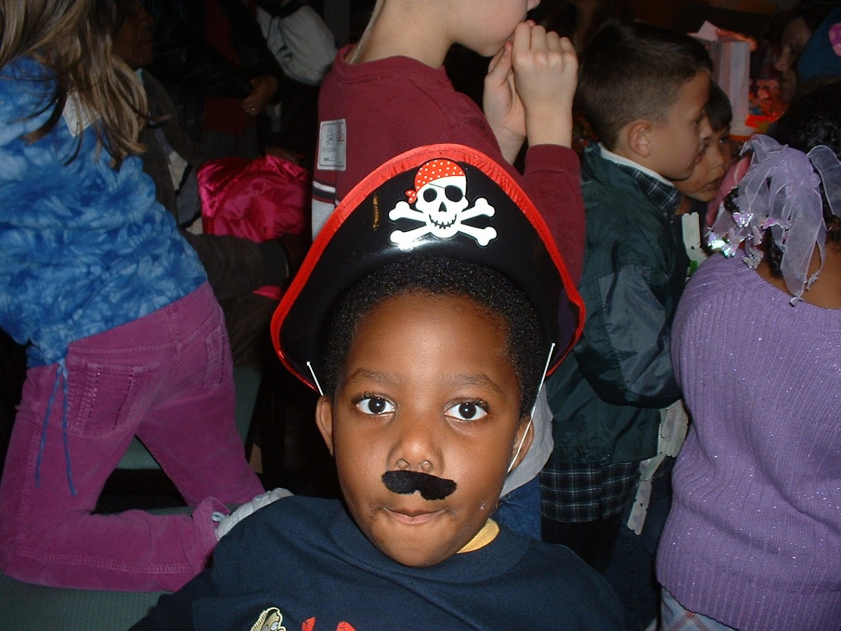 Myles as a kid in a pirate hat